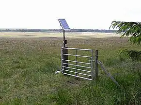 Solar powered electric fence, in Harwood Northumberland, UK.