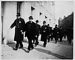Officers of the New York City Police Department wearing helmets in Brooklyn, circa 1872–1887.