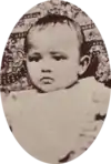 Oval photograph of young baby, 1885.