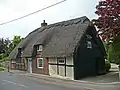 69 High Street, a thatched 15th century cruck cottage