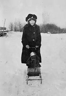 Woman pushing a stroller