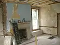 Inside of the John Work House near beginning of restoration