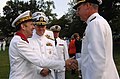 CEMM Admiral Pierre-Francois Forissier (left) greeting Vice-Admiral Kevin M. McCoy.