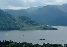 A lake surrounded by mountains