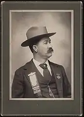 Member of Albert Sidney Johnston Camp, No. 48, UCV, Tyler, Texas, wearing a Southern Cross of Honor