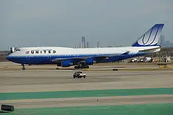 Boeing 747-400 at O'Hare International Airport in "Rising Blue" or "Blue Tulip" livery (2004–10)