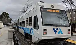VTA bus (top) and light rail vehicle (bottom)
