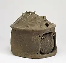 Image 70Funerary urn of the Villanovan culture, precursor to Etruscan civilization (from Founding of Rome)