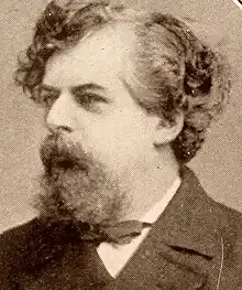 Bearded 19th-century artist with unkempt hair and passionate expression