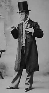 White man in long frock coat and top hat
