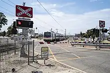 Level crossing with a train crossing through