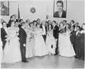 President Dwight D. Eisenhower and First Lady Mamie Eisenhower with other guests at an inaugural ball held on January 20, 1953.